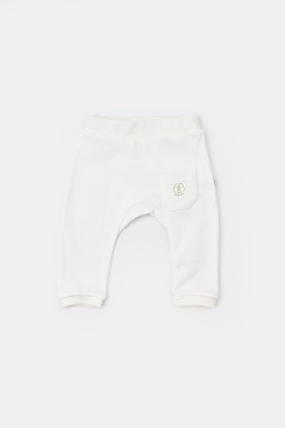 GOTS sertifikalı, organik pamuklu Basic Nature desenli unisex bebek patiksiz tek alt – 0-12 ay arası bebekler için rahat ve nefes alabilir kumaş.