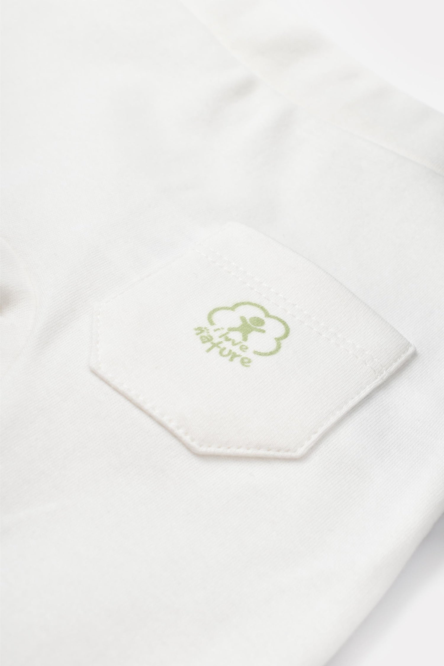 GOTS sertifikalı, organik pamuklu Basic Nature desenli unisex bebek patiksiz tek alt – 0-12 ay arası bebekler için rahat ve nefes alabilir kumaş.