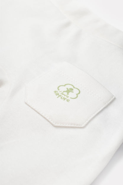 GOTS sertifikalı, organik pamuklu Basic Nature desenli unisex bebek patiksiz tek alt – 0-12 ay arası bebekler için rahat ve nefes alabilir kumaş.