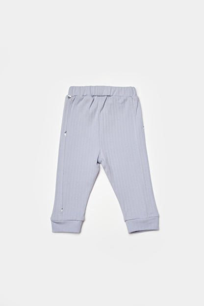 GOTS sertifikalı, organik pamuklu Love Floral desenli unisex lila renkli  bebek tek alt – 6-36 ay arası kullanım için uygun, esnek bel yapısıyla rahatlık sunar.